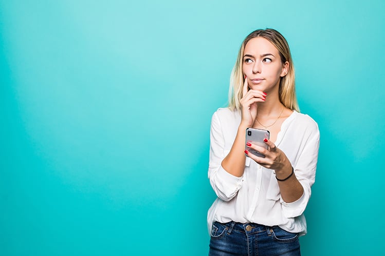 woman thinking what to text
