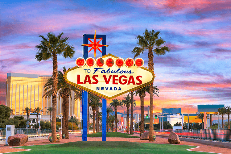 las vegas sign during sunset blue pink sky